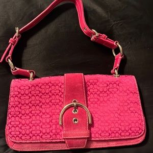Coach raspberry mini handbag. Never used. No stains, rips or tears. Beautiful!